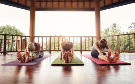 three-women-practicing-paschimottanasana-pose-at-y-P7F46KA.jpg three-women-practicing-paschimottanasana-pose-at-y-P7F46KA.jpg